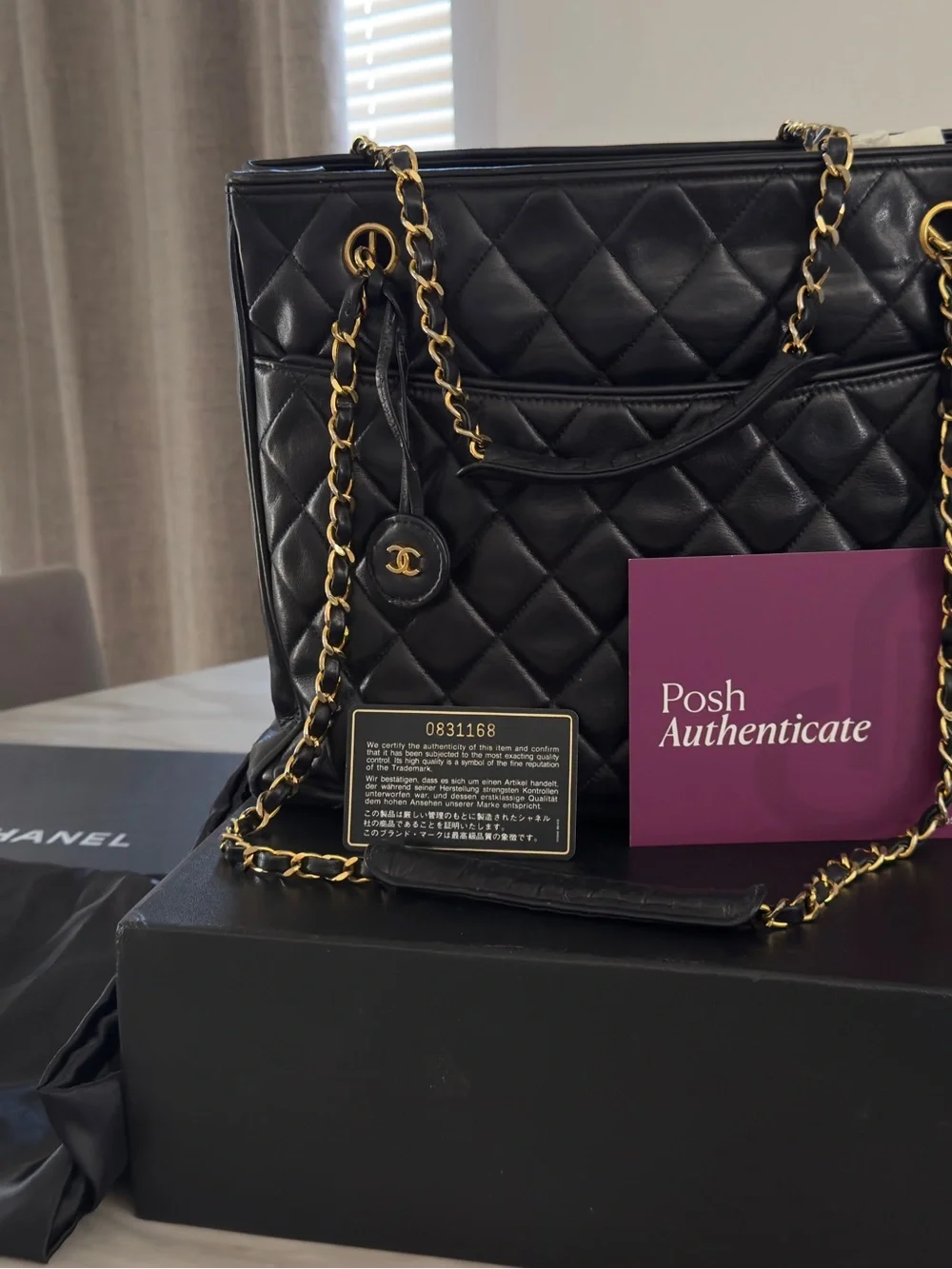 CHANEL Black Quilted Leather Shoulder Bag with Gold Chain